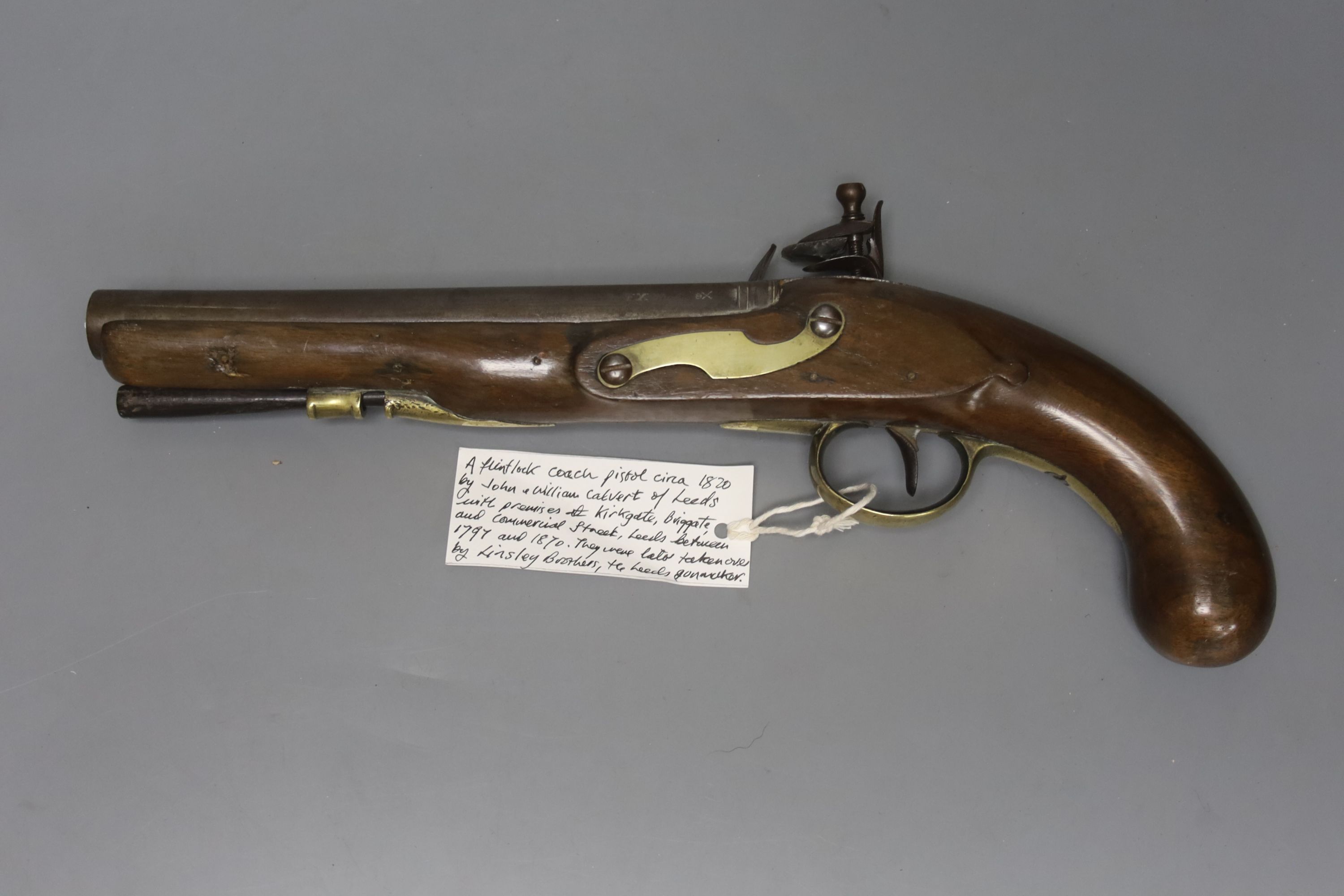 A flintlock coach pistol, circa 1820 by John and William Calvetrt of Leeds, approx. 35cm long